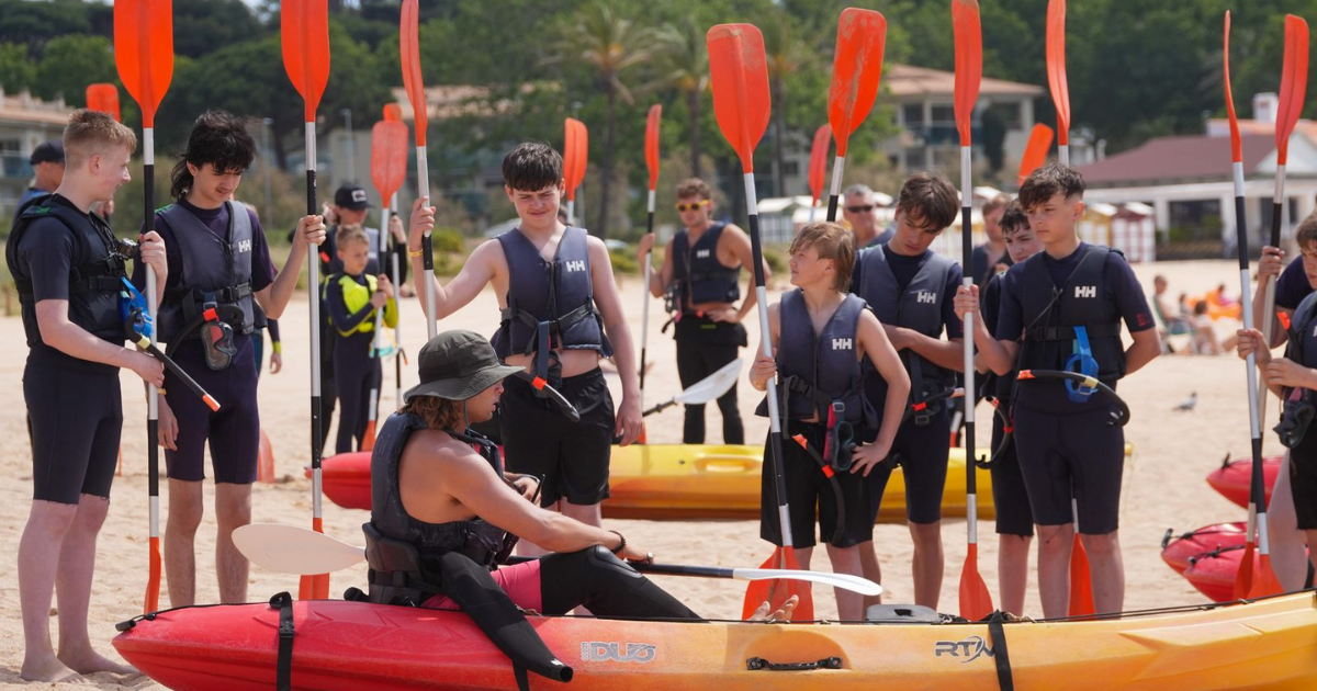 kayak instruction on school watersports trip to spain